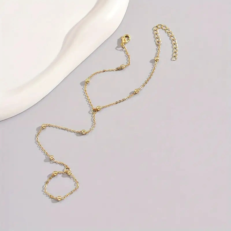 Elegant Hand Chain Bracelet with Chain & Pressed Pattern Detail