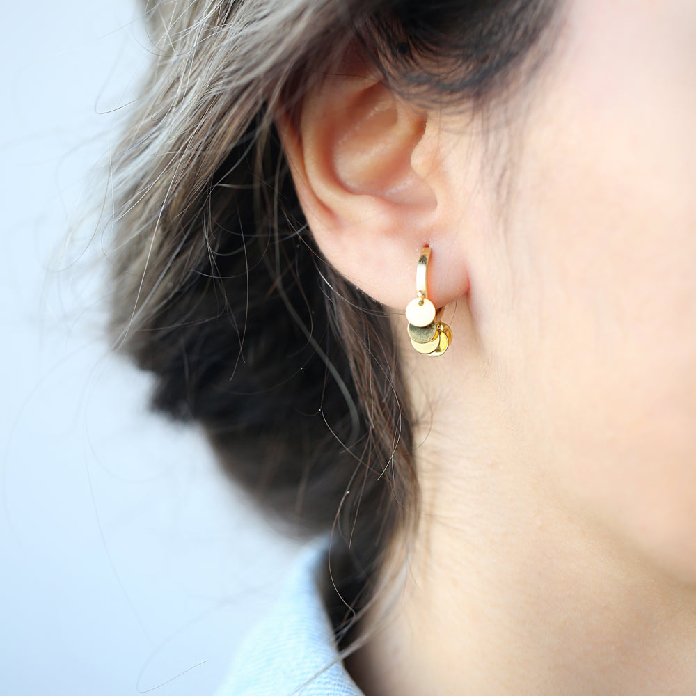 Earring with rounded charms